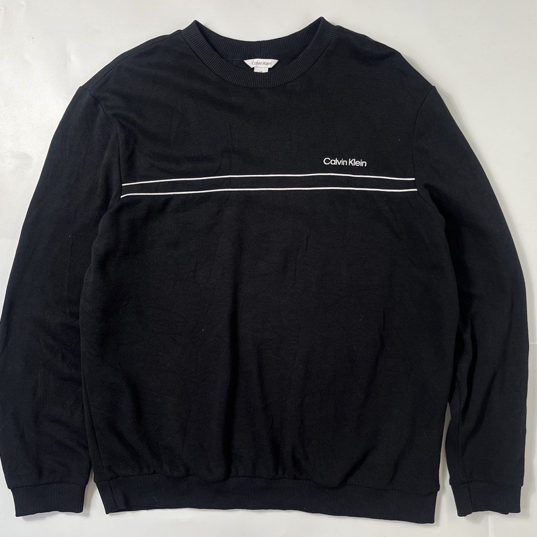 Calvin Klein Mesh Black Sweater Embroid design (Category: Coats, Jackets and Outerwear) located in Nasugbu. Submitted by janstuffs.ph (Listing ID 1469744455, Image 1). Description: CK Mesh Sweater Super comfy 💯Legit! Size: Large on tag - Best fit XL Width: 25" Length: 29" Sleeve: 25" Condition: 10/10 Like New! Flaw: NONE Mine: 980.
