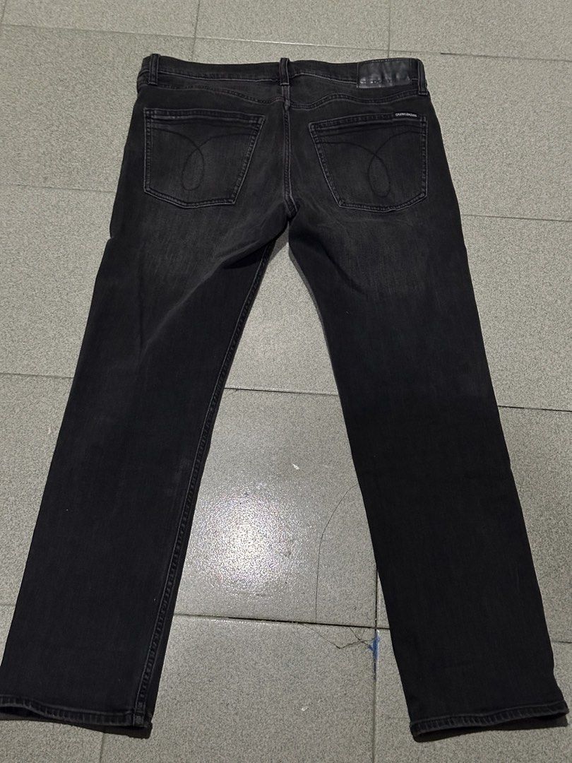 Calvin Klein Straight Jeans (Category: Jeans) located in Talisay. Submitted by kuyav (Listing ID 1469667144, Image 2). Description: Authentic Calvin Klein Straight Jeans in Black - Chic - Personally bought - 8cm Leg opening - 32W x 30L - Still looks good - used once .