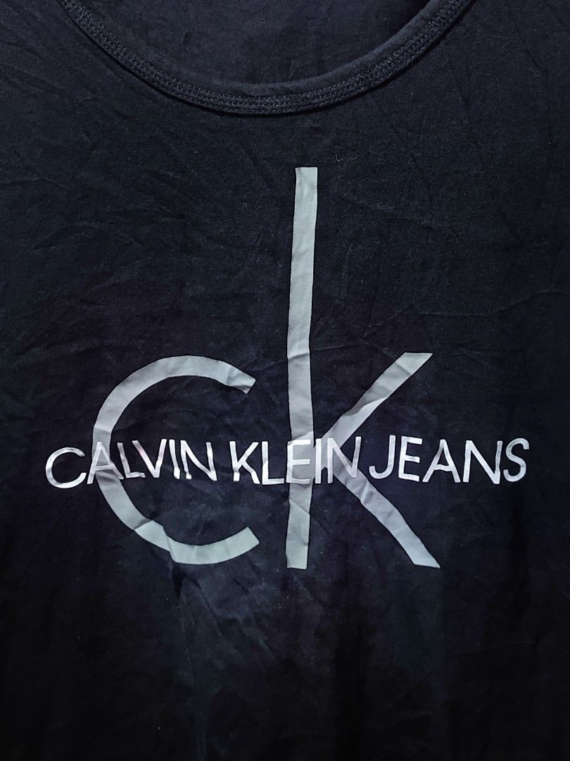 Calvin Klein tank top Large (Category: Tshirts & Polo Shirts ) located in Cebu City. Submitted by negotiableprice22 (Listing ID 1469704348, Image 2). Description: Calvin Klein tank top Calvin Klein black size Large Dimes Width 21 inch Length 27 inch no issue available accepting offers.