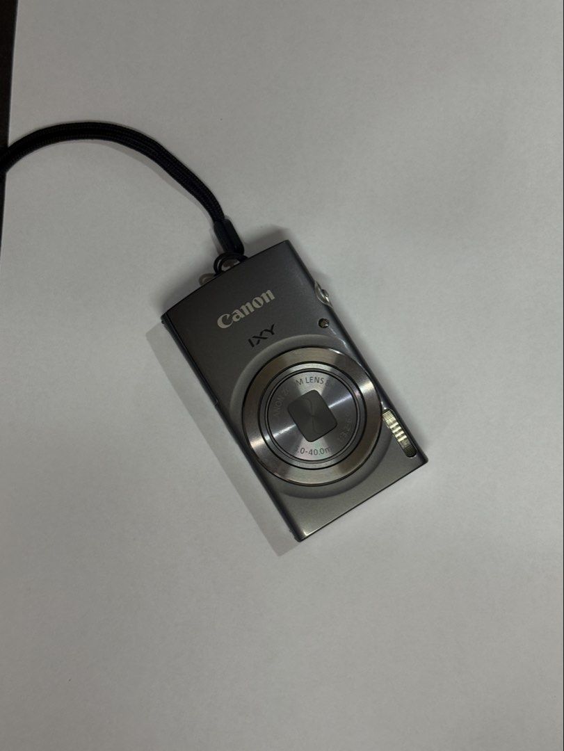 Canon IXY 150 (Still Negotiable) (Category: Cameras) located in Mandaluyong City. Submitted by sunevvv (Listing ID 1469657904, Image 2). Description: Condition: Good as new, no major scratches or dents. Note: No side cover Inclusions: • Original Canon charger • Camera pouch • SD card adapter (for iPhone) Compact and easy to carry, perfect for everyday shots, travel, or as a starter camera. RFS: Need funds.