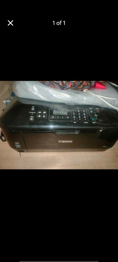 Canon MX432 All-in-One Printer (Category: Printers, Scanners & Copiers) located in Manila. Submitted by billythekid05 (Listing ID 1469722272, Image 1). Description: - Model: Canon MX432 Multifunction Printer (Black) - Functions: Print, Copy, Scan, Fax - Features: Numeric keypad, small LCD screen, and standard top feeder tray - Condition: Powers up normally, fully functional - Ideal for: Home office use, school paperwork, and daily scanning tasks.