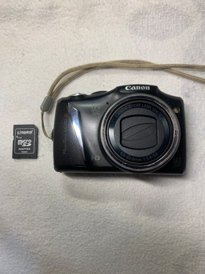 Canon PowerShot SX130 IS Digital Camera (Category: Cameras) located in Baguio. Submitted by grazia.ivy (Listing ID 1469627674, Image 1). Description: Selling a pre-loved vintage Canon PowerShot SX130 IS compact digital camera. Inclusions: Memory Card included Condition: With minor hairline scratches from normal use, but no cracks or deep dents Quick note po: ​To prevent the "Change the batteries" trigger prompt, this camera MUST be used with genu
