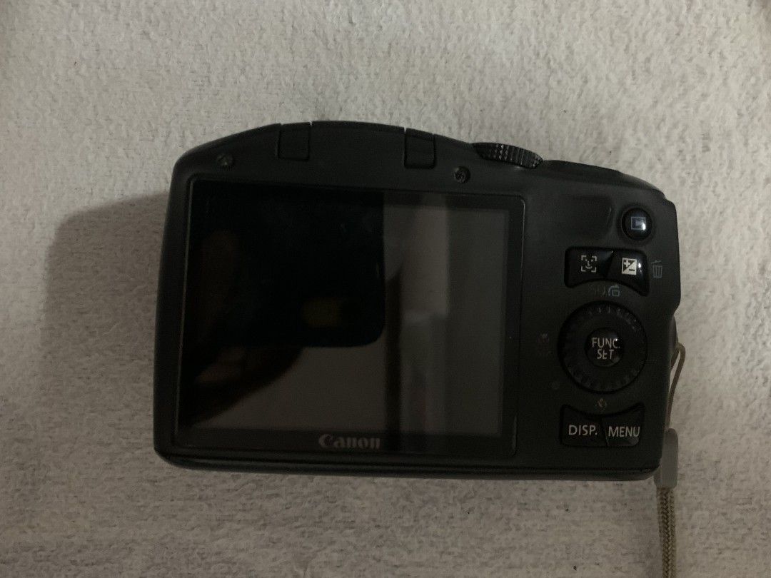 Canon PowerShot SX130 IS Digital Camera (Category: Cameras) located in Baguio. Submitted by grazia.ivy (Listing ID 1469627674, Image 3). Description: Selling a pre-loved vintage Canon PowerShot SX130 IS compact digital camera. Inclusions: Memory Card included Condition: With minor hairline scratches from normal use, but no cracks or deep dents Quick note po: ​To prevent the "Change the batteries" trigger prompt, this camera MUST be used with genu