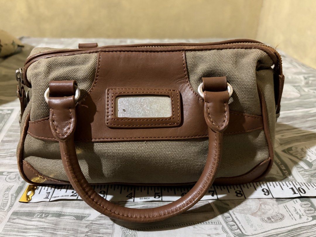 Canvas mini handbag (Category: Purses & Pouches) located in Quezon City. Submitted by itszoe_ (Listing ID 1469724314, Image 1). Description: • Canvas bag mini handbag • Can fit Iphone pro max models • Can fit essentials w/o umbrella * Payment first before shipment. * Mode of payment: Bank transfer/E-wallet.