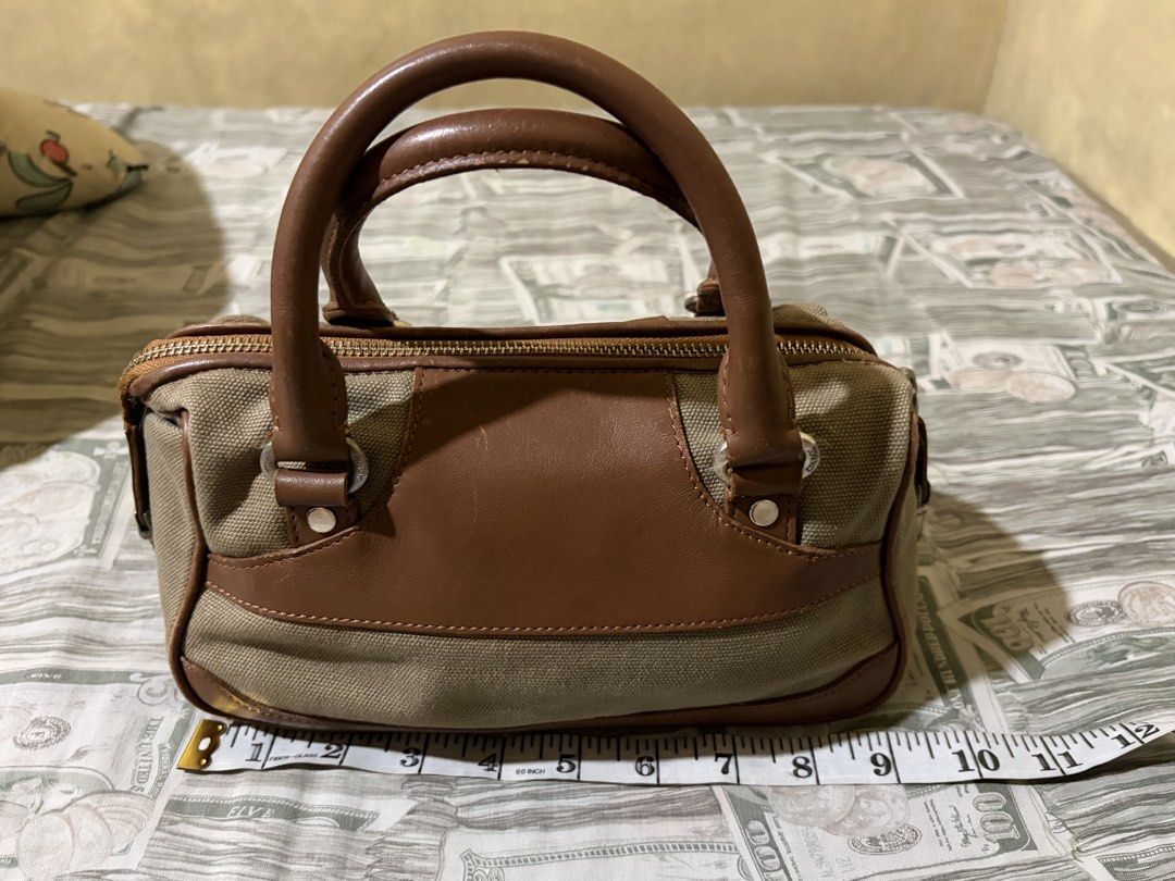 Canvas mini handbag (Category: Purses & Pouches) located in Quezon City. Submitted by itszoe_ (Listing ID 1469724314, Image 2). Description: • Canvas bag mini handbag • Can fit Iphone pro max models • Can fit essentials w/o umbrella * Payment first before shipment. * Mode of payment: Bank transfer/E-wallet.