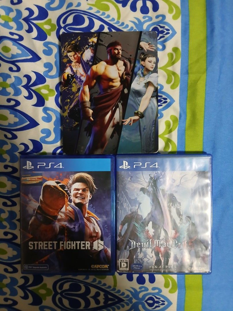Capcom PlayStation 4 Games and Steelbook Bundle (Category: PlayStation) located in Paranaque City. Submitted by juntee.pabo (Listing ID 1469670941, Image 1). Description: - Platform: PlayStation 4 (PS4) - Games included: Street Fighter 6 & Devil May Cry 5 - Special inclusion: Official Street Fighter 6 steelbook case alongside standard cases - Condition: Clean discs and cases, well-maintained - Ideal for: Capcom fighting and action game enthusiast