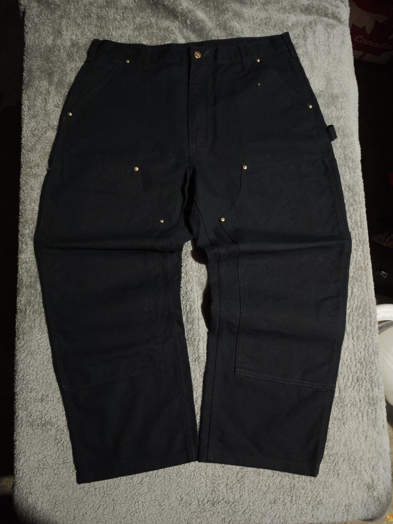 CARHARTT DOUBLE KNEE (Category: Jeans) located in Dalaguete. Submitted by three7archives (Listing ID 1469699159, Image 2). Description: - Brand/Model: Carhartt Double Knee work pants - Color: Classic Black - AS NEW - Size: US 36 / EU 46 / UK 36 (XL) - Material: Heavy-duty durable canvas - Features: Double knee reinforcement, gold-tone metal rivets, utility pockets, and hammer loop - Condition: Excellent, well-maintained.