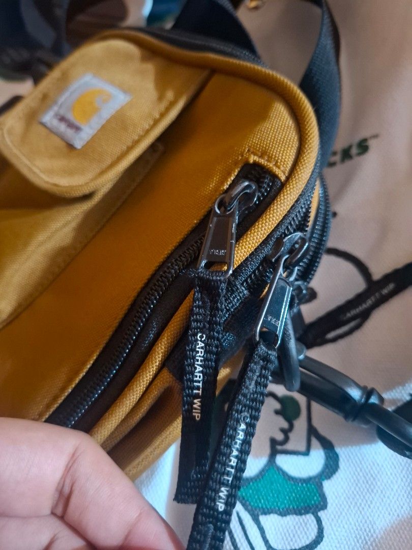 CARHARTT WIP HAMILTON BROWN ESSENTIAL BAG (Category: Sling Bags) located in Manila. Submitted by bonaobrag55538 (Listing ID 1469600975, Image 3). Description: EXCELLENT CONDITION NO ISSUE.
