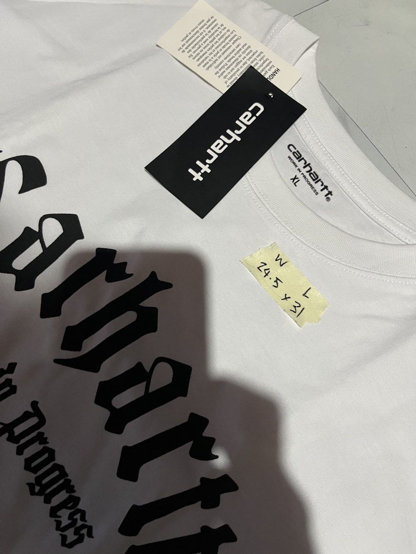 Carhartt Work in Progress Script T-Shirt White XL (Category: Tshirts & Polo Shirts ) located in Cavite. Submitted by christianzuuu (Listing ID 1469739896, Image 3). Description: - Brand: Carhartt WIP - Item: Script T-Shirt - Color: White with bold black chest lettering - Size: XL - Material: 100% cotton (Made in Bangladesh) - Condition: Brand new, unworn with original tags attached.