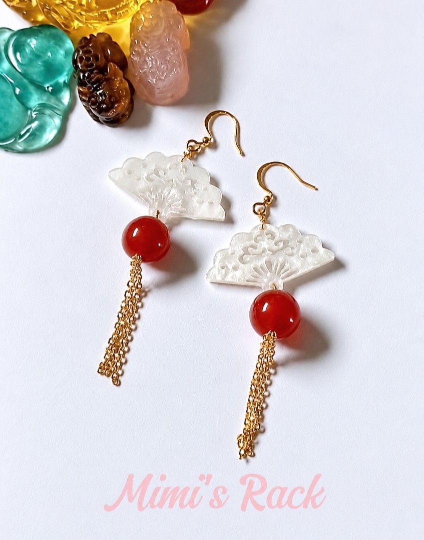 CARNELIAN WITH FAN DANGLING EARRINGS (Category: Earrings) located in Taguig. Submitted by mimisrack (Listing ID 1469752318, Image 1). Description: 🧡Warm, graceful earrings that bring confidence, creativity, and elegant movement -Carnelian is known for boosting confidence, motivation, and creative energy -Encourages vitality, courage, and positive self-expression -Fan design symbolizes grace, flow, and gentle expansion of energy -Dangling style a