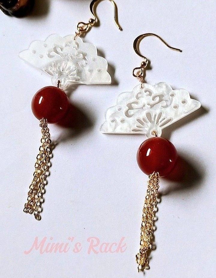 CARNELIAN WITH FAN DANGLING EARRINGS (Category: Earrings) located in Taguig. Submitted by mimisrack (Listing ID 1469752318, Image 2). Description: 🧡Warm, graceful earrings that bring confidence, creativity, and elegant movement -Carnelian is known for boosting confidence, motivation, and creative energy -Encourages vitality, courage, and positive self-expression -Fan design symbolizes grace, flow, and gentle expansion of energy -Dangling style a