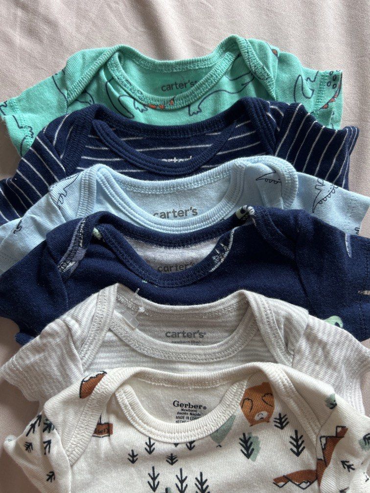 Carters & Gerber NB onesie (Category: Babies & Kids Fashion) located in Quezon City. Submitted by declutter.qc (Listing ID 1469581730, Image 2). Description: 5 carters & 1 Gerber RFS: big baby at nilakihan agad.