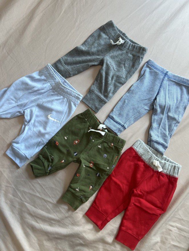 Carters & Nike NB Pants (Category: Babies & Kids Fashion) located in Quezon City. Submitted by declutter.qc (Listing ID 1469579968, Image 3). Description: 4 carters & 1 Nike.