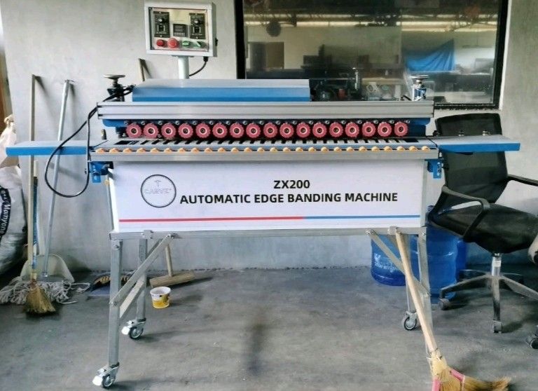 Carve ZX200 Automatic Edge Banding Machine (Category: Industrial Equipment) located in San Pedro. Submitted by rynnpzn (Listing ID 1469688050, Image 1). Description: - Model: Carve ZX200 Automatic Edge Banding Machine - Heavy-duty build designed for professional woodworking workshops - Equipped with smooth-rolling wheels for easy mobility around the shop - Features an intuitive top-mounted control panel for convenient operation - Includes multipl