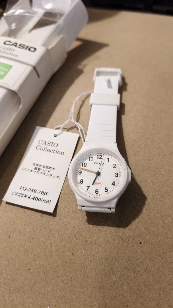 Casio Collection LQ-24B-7BJF White Watch (Category: Women's Watches) located in Bamban. Submitted by gooogleu253 (Listing ID 1469704739, Image 3). Description: - Brand: Casio Collection - Model: LQ-24B-7BJF - Condition: Brand new, unworn with original tags attached - Color: White resin band, white dial with black numbers and orange second hand - Features: Water resistant - Inclusions: Complete with original box packaging - Retail value: 4400 JPY.