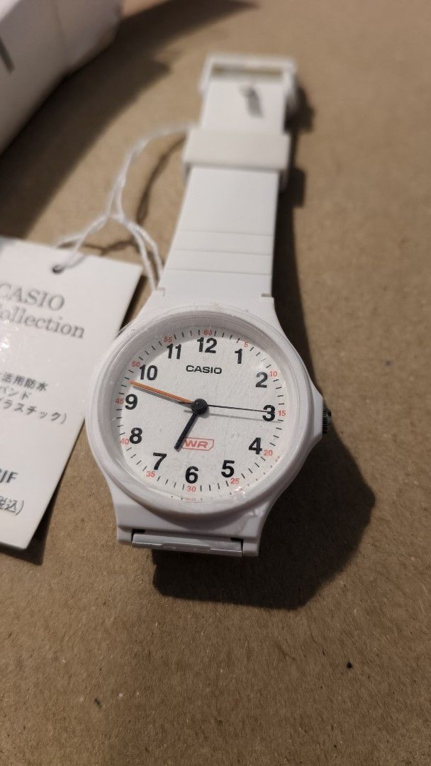 Casio Collection LQ-24B-7BJF White Watch (Category: Women's Watches) located in Bamban. Submitted by gooogleu253 (Listing ID 1469704739, Image 2). Description: - Brand: Casio Collection - Model: LQ-24B-7BJF - Condition: Brand new, unworn with original tags attached - Color: White resin band, white dial with black numbers and orange second hand - Features: Water resistant - Inclusions: Complete with original box packaging - Retail value: 4400 JPY.