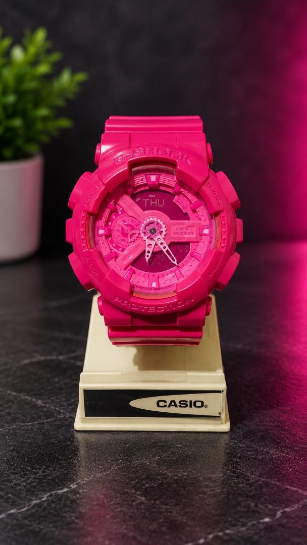 Casio G-Shock Pink Analog Digital Watch (Category: Women's Watches) located in Manila. Submitted by Decca0310 (Listing ID 1469675578, Image 2). Description: - Model: Casio G-Shock (Bright Pink Monochrome) - Display: Combo Analog and Digital (shows 'THU' on the upper screen) - Durability: Shock-resistant build with WR20BAR water resistance - Design: Bold, eye-catching bright pink color from band to face dial - Condition: Great pre-loved/display co