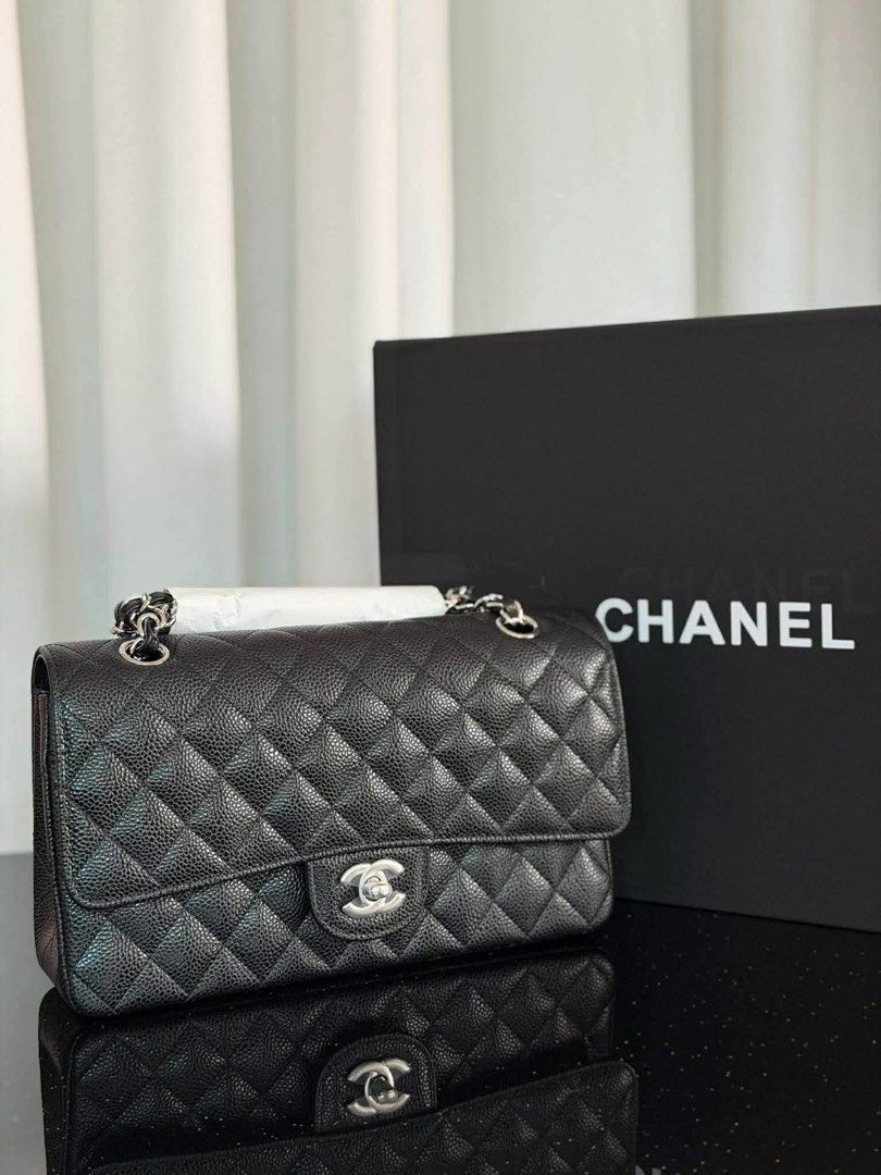 CC Classic Flap Bag Black Caviar Leather Silver Hardware (Category: Luxury Bags & Wallets) located in Manila. Submitted by bagsandmanymanymore1 (Listing ID 1458590030, Image 1). Description: - Classic CC flap bag -Size 25cm - Black caviar leather -What you see is what you get - Silver hardware - Iconic quilted design - Deep burgundy interior - Comes with original box Please read before you order 👉🏻❗️Payment first before shipping ❗️Cut off time 