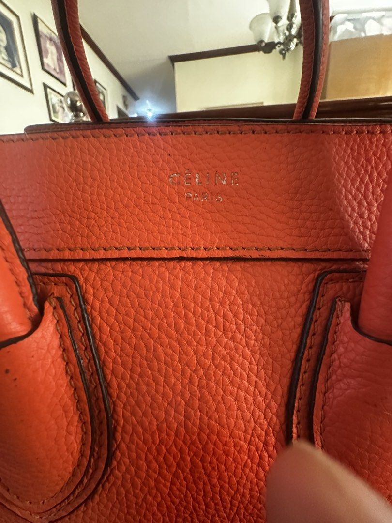 CELINE MICRO LUGGAGE in Vermillion Orange (Category: Tote Bags) located in Dasmarinas. Submitted by vintagevoom (Listing ID 1469644204, Image 2). Description: Celine Micro Luggage in Vermillion Orange NEGOTIABLE Thrifted - NGA (Kindly self authenticate) Minor signs of usage Coded Intact rubber lining Dimensions: L - 10 inches H - 10 inches W - 6 inches.