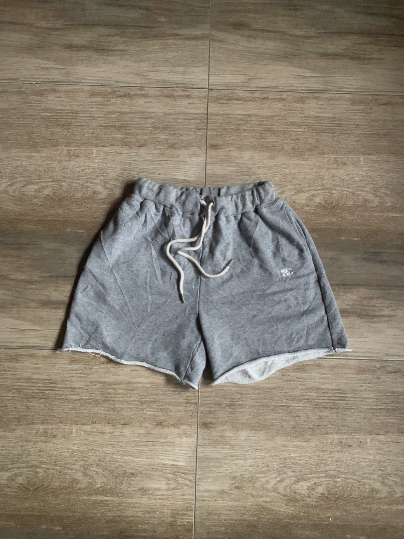 Celine Paris Grey Sweat Shorts Size M (Category: Shorts) located in Tarlac. Submitted by luxurious_apparel (Listing ID 1469658665, Image 1). Description: - Brand: Celine Paris - Size: M (tags attached) -Unisex - Color: Grey with cream drawstrings and metal aglets - Details: Small white embroidered Celine logo on left leg, trendy raw edge hem - Interior: Soft and cozy fleece lining - Condition: Brand new with back tags intact.