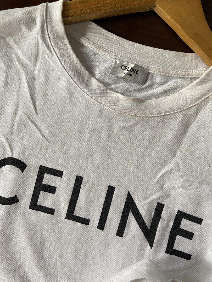 Celine White Tee (Category: Luxury Apparel) located in Panabo. Submitted by thrifty.red (Listing ID 1469625611, Image 2). Description: width:18 length:26 small to medium Excellent no issue washable stain only.