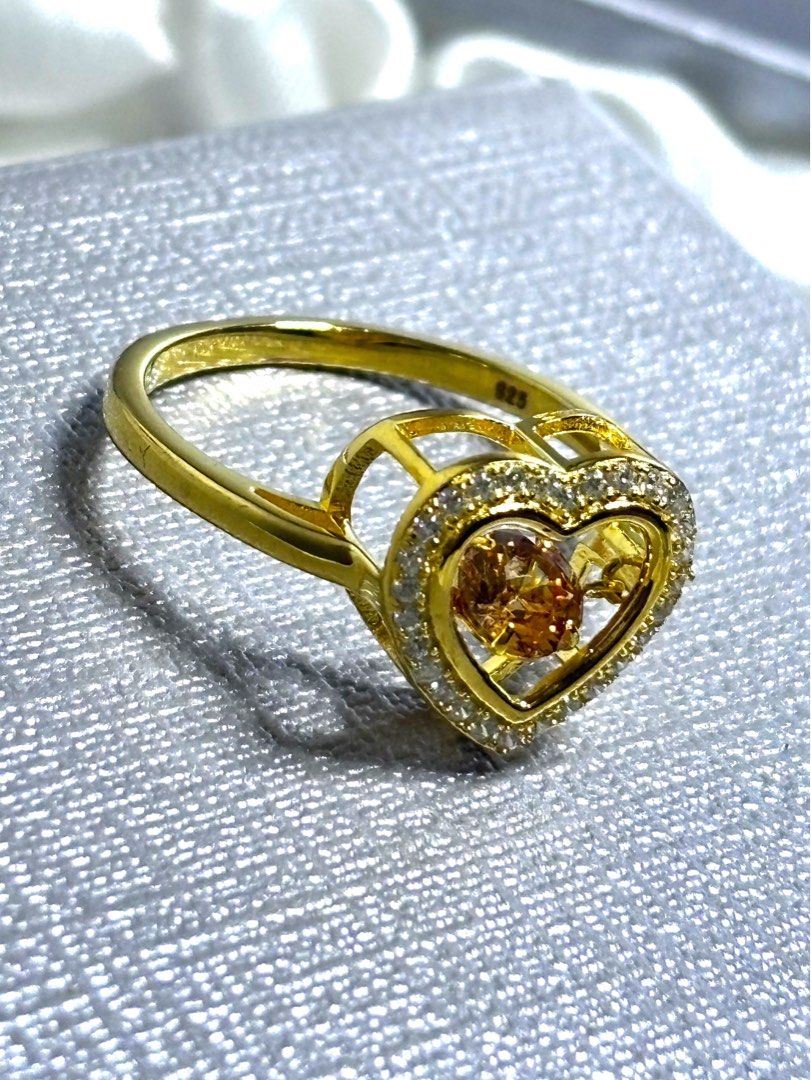 CHAMPAGNE DANCING HEART HALO RING 925 Silver (Category: Rings) located in Manila. Submitted by bentaandco (Listing ID 1469688310, Image 2). Description: 🤎 CHAMPAGNE CZ HEART HALO RING ✨ A romantic heart-shaped design featuring a warm champagne-colored center stone surrounded by sparkling white cubic zirconia accents. A beautiful statement piece for date nights, special occasions, or everyday elegance. ✨ 925 Sterling Silver ✨ Champagne-Colored CZ