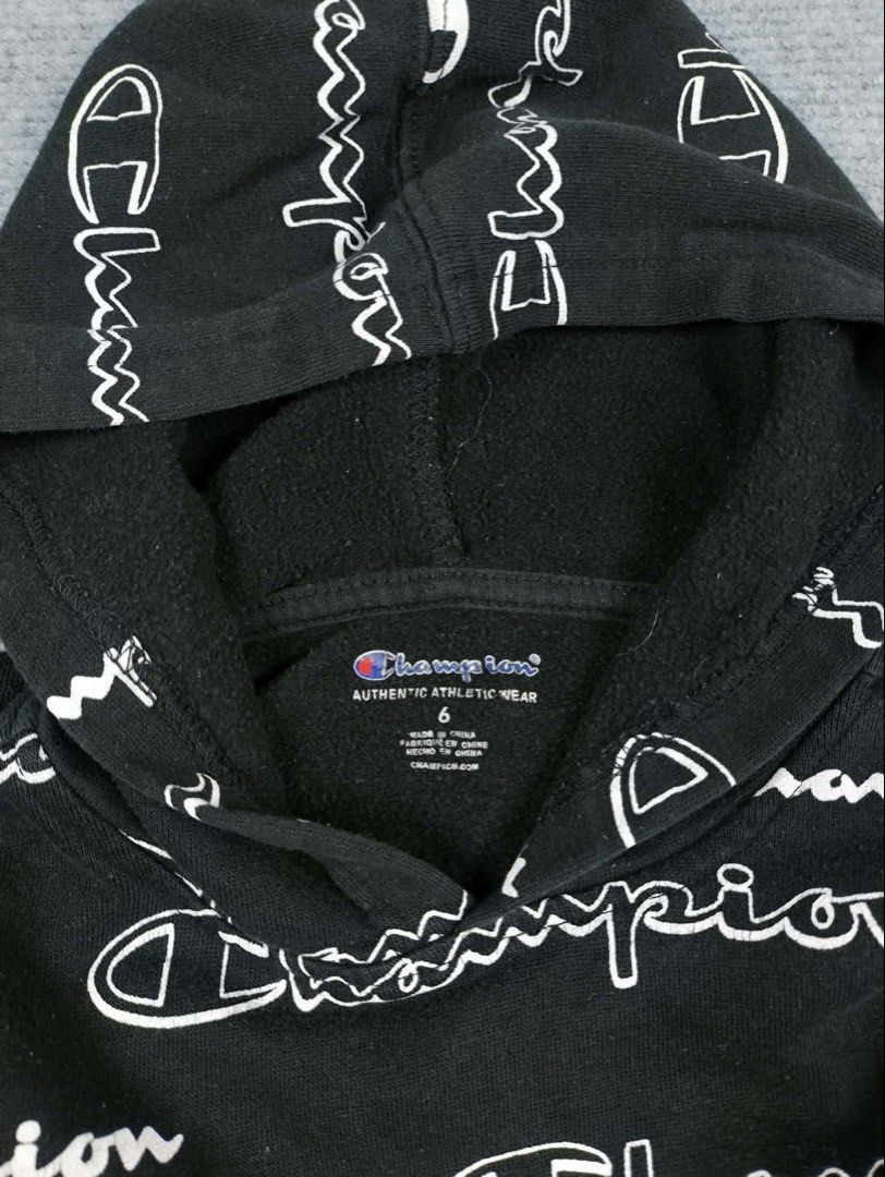 Champion AOP Pullover Hoodie (Kids) (Category: Babies & Kids Fashion) located in Manila. Submitted by secondhand.stories.ph (Listing ID 1469734576, Image 2). Description: Champion AOP Pullover Hoodie (Kids) Excellent Condition Size 6 (4-6YR OLD) 300 +SF.