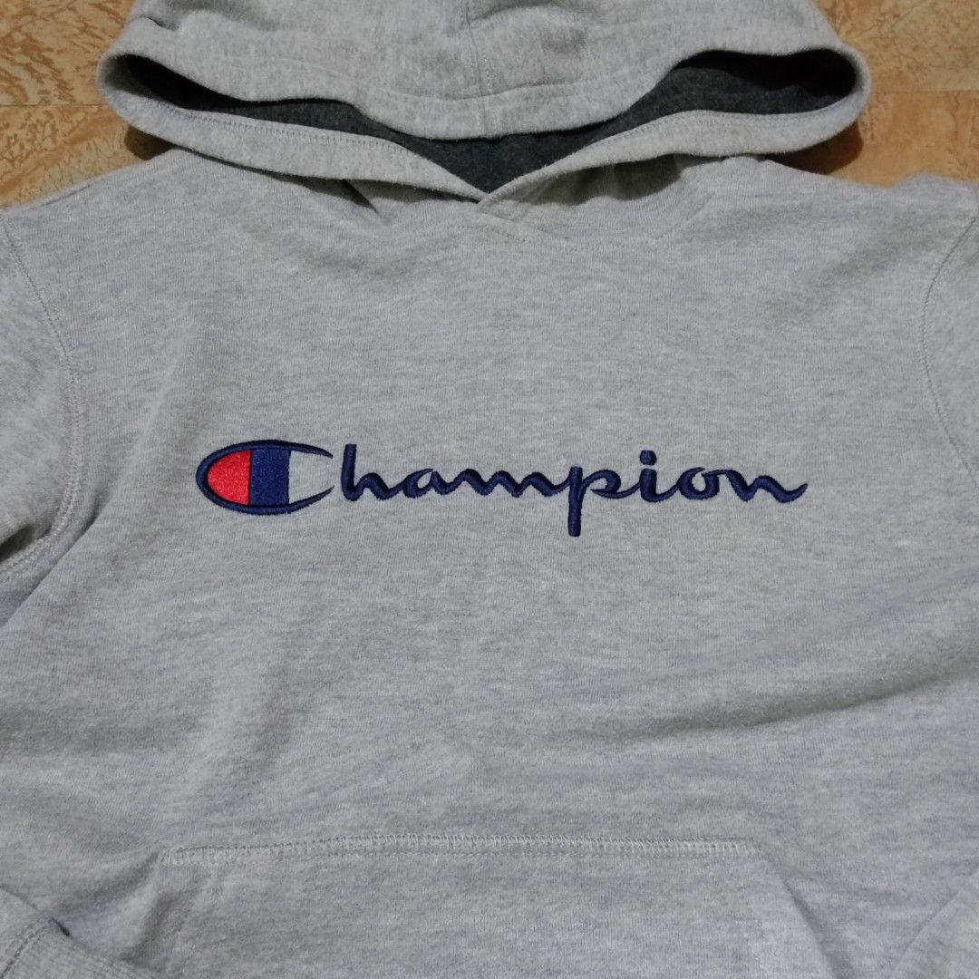 Champion Grey Pullover Hoodie (Category: Coats, Jackets and Outerwear) located in Valenzuela. Submitted by 0003c4 (Listing ID 1469750328, Image 2). Description: classic pullover style with an attached hood with flaws, see photos for reference tagged large but fits small :) location: Valenzuela or Malabon mod: lalamove or jnt.