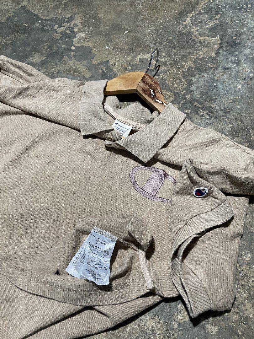 Champion Polo shirt (Category: Activewear) located in Munoz. Submitted by bb_jimbo0 (Listing ID 1469573508, Image 2). Description: M on tag Like new condition .