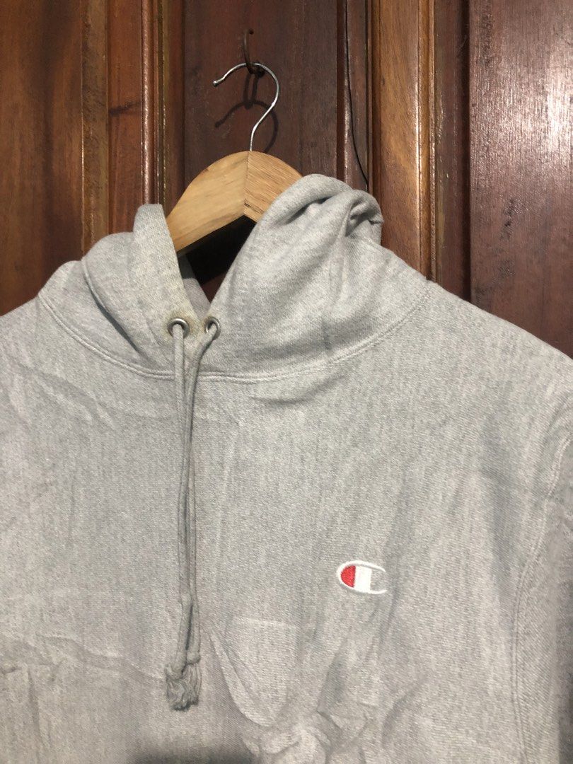 Champion Reverse Weave Grey Hoodie Size Small (Category: Hoodies) located in Quezon City. Submitted by yeahsource222 (Listing ID 1469744978, Image 2). Description: - Brand/Model: Champion Reverse Weave Hoodie - Color: Light Grey - Size: Small (fits true to size) - Material: Heavyweight cotton fleece - Features: Classic embroidered chest logo, small left cuff patch, drawstring hood with metal eyelets, and front pouch pocket - Origin: Made in Hondu