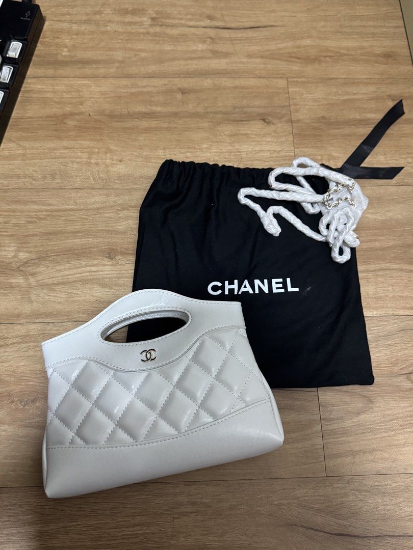 ❗️OCTOBER SALE❗️ Chanel 31 nano shopping bag (Category: Clutches) located in Manila. Submitted by bookishtati (Listing ID 1469673966, Image 1). Description: Minor flaw, color transfer at the front Can reattach chain.