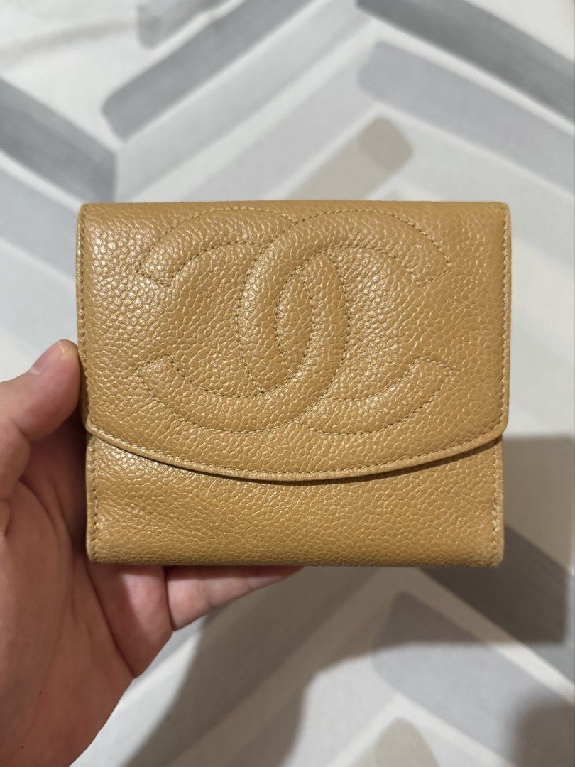 Chanel Caviar Leather Wallet Beige (Category: Wallets & Card holders) located in Tagbilaran City. Submitted by neinjah (Listing ID 1469644613, Image 2). Description: - Brand: Chanel - Material: Caviar Leather - Color: Beige - Features: Embossed CC logo, snap button closure, multiple card slots, and a coin compartment with press stud closure - Issues: Leather Smell, Coin Slot Cloth has signs of use - Inclusion: box.