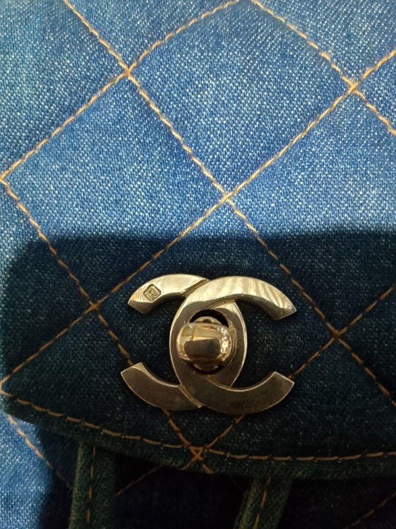 Chanel Denim Handbag with CC Logo Zipper Pull (Category: Luxury Bags & Wallets) located in Iloilo. Submitted by janillthrifted (Listing ID 1469697937, Image 2). Description: - Authentic denim handbag featuring classic quilted fabric and contrast stitching - Elegant silver hardware paired with a stylish chain strap - Iconic Chanel CC interlocking logo stamped on the zipper pull - Spacious casual everyday carryall with a distinct, trendy denim text