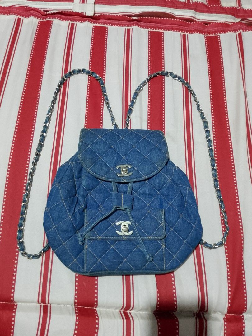 Chanel Denim Handbag with CC Logo Zipper Pull (Category: Luxury Bags & Wallets) located in Iloilo. Submitted by janillthrifted (Listing ID 1469697937, Image 1). Description: - Authentic denim handbag featuring classic quilted fabric and contrast stitching - Elegant silver hardware paired with a stylish chain strap - Iconic Chanel CC interlocking logo stamped on the zipper pull - Spacious casual everyday carryall with a distinct, trendy denim text