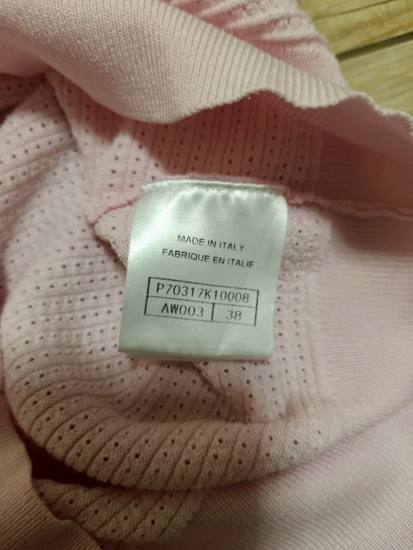 Chanel knit puff polo top (Category: Others Tops) located in Siniloan. Submitted by talktotheroses (Listing ID 1469667721, Image 3). Description: .