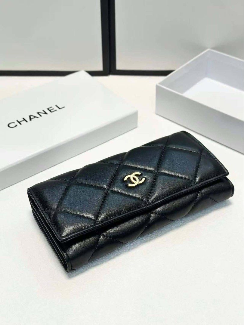 Chanel Long Wallet (Category: Wallets & Card holders) located in Quezon City. Submitted by stuffs.hellyy (Listing ID 1469714600, Image 1). Description: with dust bag & box.