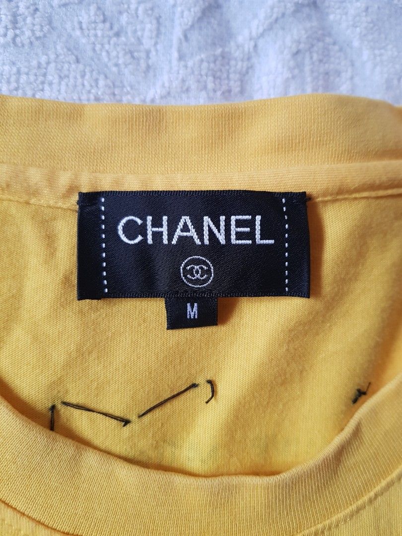Chanel Pharell Long Sleeve Shirt (Category: Luxury Apparel) located in Santo Domingo. Submitted by jcobedoza213916 (Listing ID 1469579524, Image 3). Description: Chanel Pharell Long Sleeve Shirt women's width 20 lenght 24 goods ribbings excellent condition color rate 9.7/10 issue: last picture Dirt.