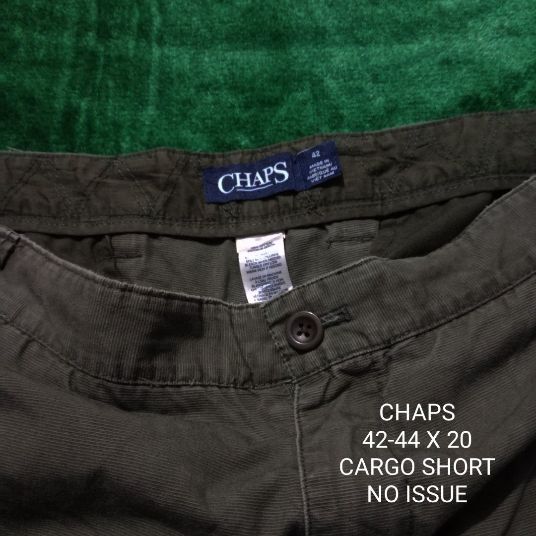 Chaps Cargo Shorts Olive Green Size 42 (Category: Shorts) located in Silang. Submitted by densrodrig08604 (Listing ID 1469738893, Image 2). Description: - Brand/Model: Chaps Cargo Shorts - Color: Olive Green - Size: 42 waist - Length: 20 inches - Material: 100% Cotton (Made in Vietnam) - Features: Multiple side and back pockets, classic button closure with zipper fly - Condition: Excellent, clean fabric with no stains or rips - Style: Great for e