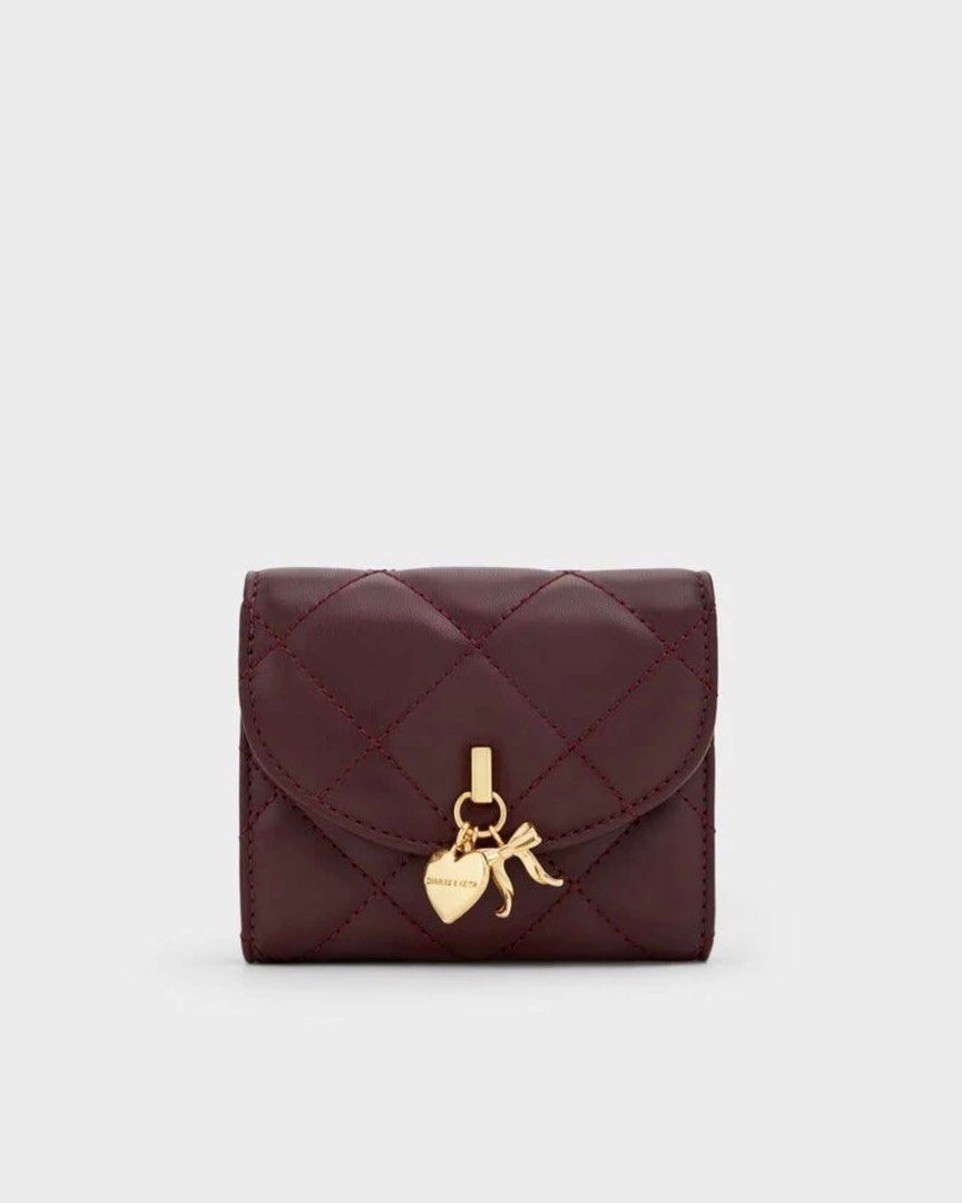 Charles & Keith Arrietty Curved Flap Wallet (Category: Wallets & Card holders) located in Pasig City. Submitted by ff.ph (Listing ID 1469748684, Image 1). Description: Bifold Wallet With Box and Tag Available in 3 colors Burgundy - Black - Cream With Small paperbag .
