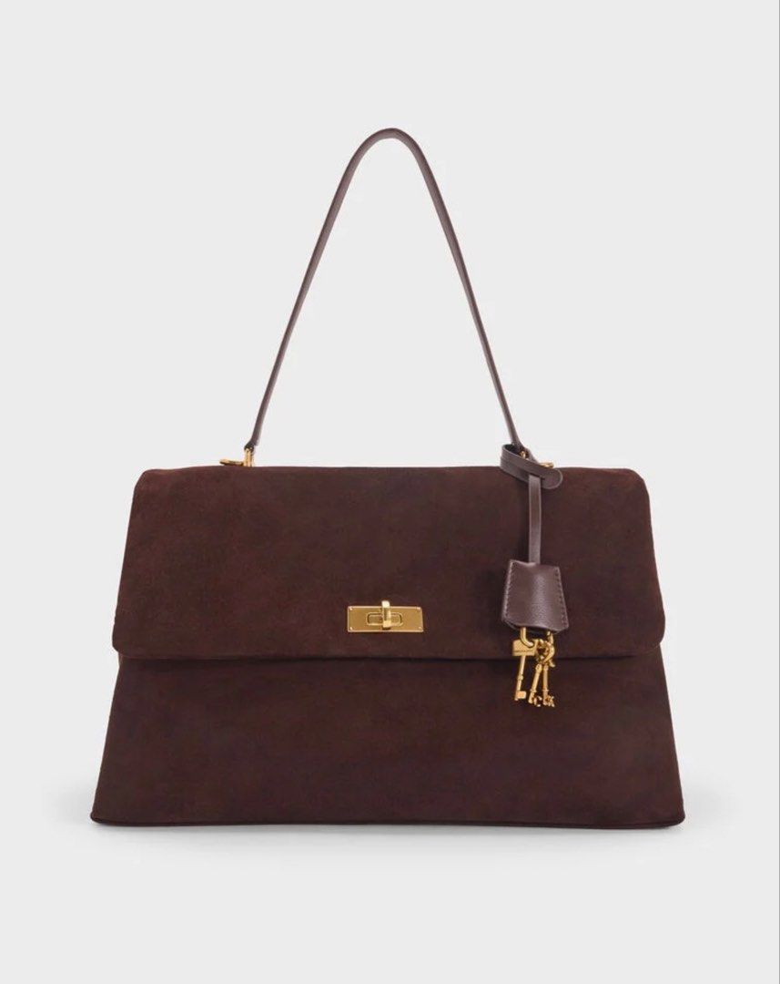 Charles & Keith Kerry Suede Top Handle Satchel Bag (Category: Tote Bags) located in Pasig City. Submitted by ff.ph (Listing ID 1469749162, Image 1). Description: Material Suede Color Espresso Brown With Shoulder Strap Size 14 inches Turn Lock Closure With Echodustbag and Tag Add paperbag plus 80 .