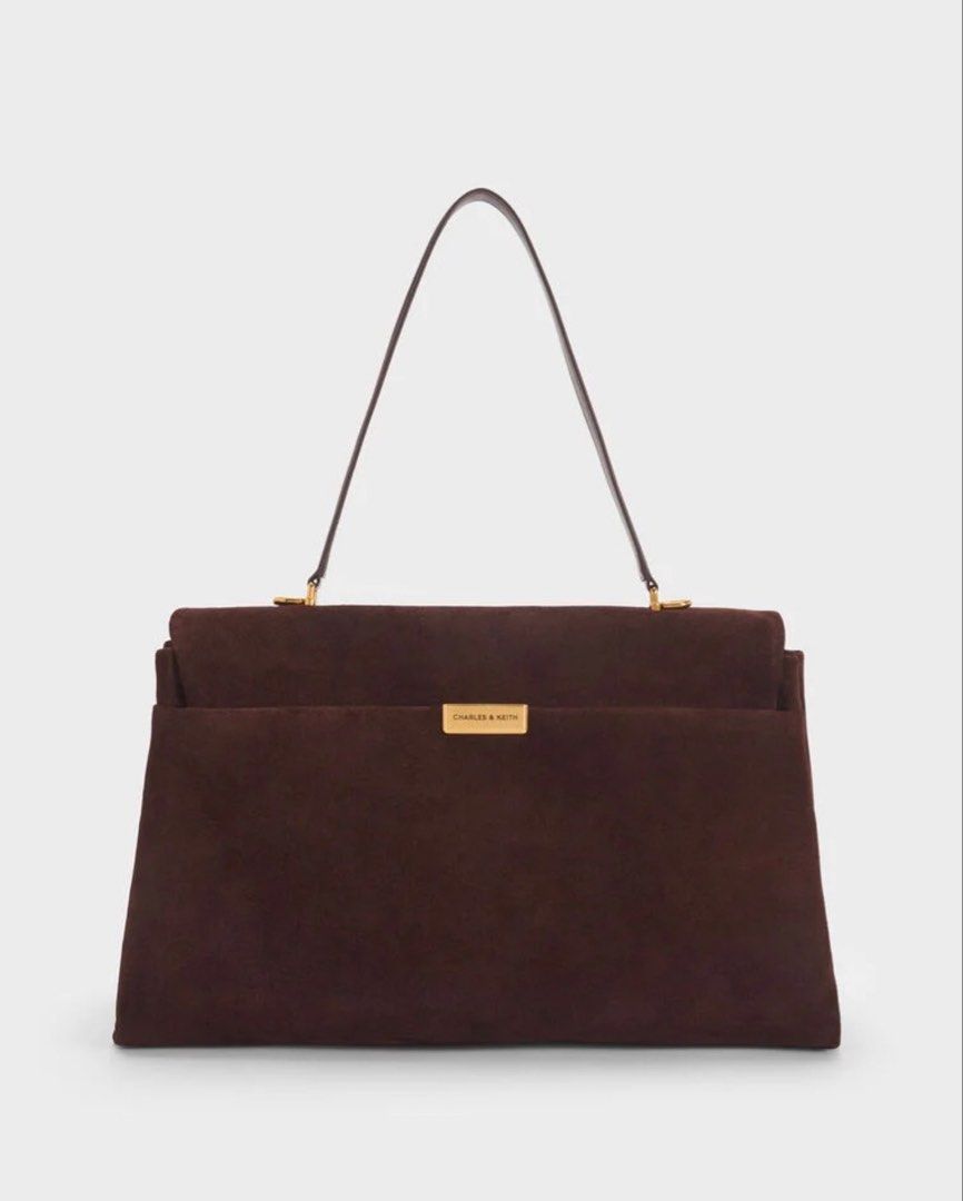 Charles & Keith Kerry Suede Top Handle Satchel Bag (Category: Tote Bags) located in Pasig City. Submitted by ff.ph (Listing ID 1469749162, Image 2). Description: Material Suede Color Espresso Brown With Shoulder Strap Size 14 inches Turn Lock Closure With Echodustbag and Tag Add paperbag plus 80 .
