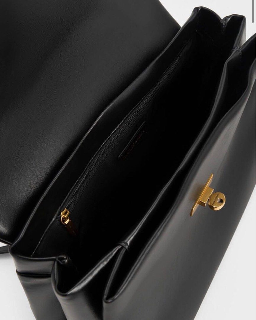Charles & Keith Kerry Top Handle Satchel Bag (Category: Tote Bags) located in Pasig City. Submitted by ff.ph (Listing ID 1469748799, Image 3). Description: Color Black With Shoulder Strap Size 14 inches Turn Lock Closure With Echodustbag and Tag Add paperbag plus 80 .