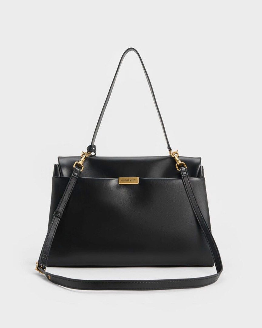 Charles & Keith Kerry Top Handle Satchel Bag (Category: Tote Bags) located in Pasig City. Submitted by ff.ph (Listing ID 1469748799, Image 2). Description: Color Black With Shoulder Strap Size 14 inches Turn Lock Closure With Echodustbag and Tag Add paperbag plus 80 .