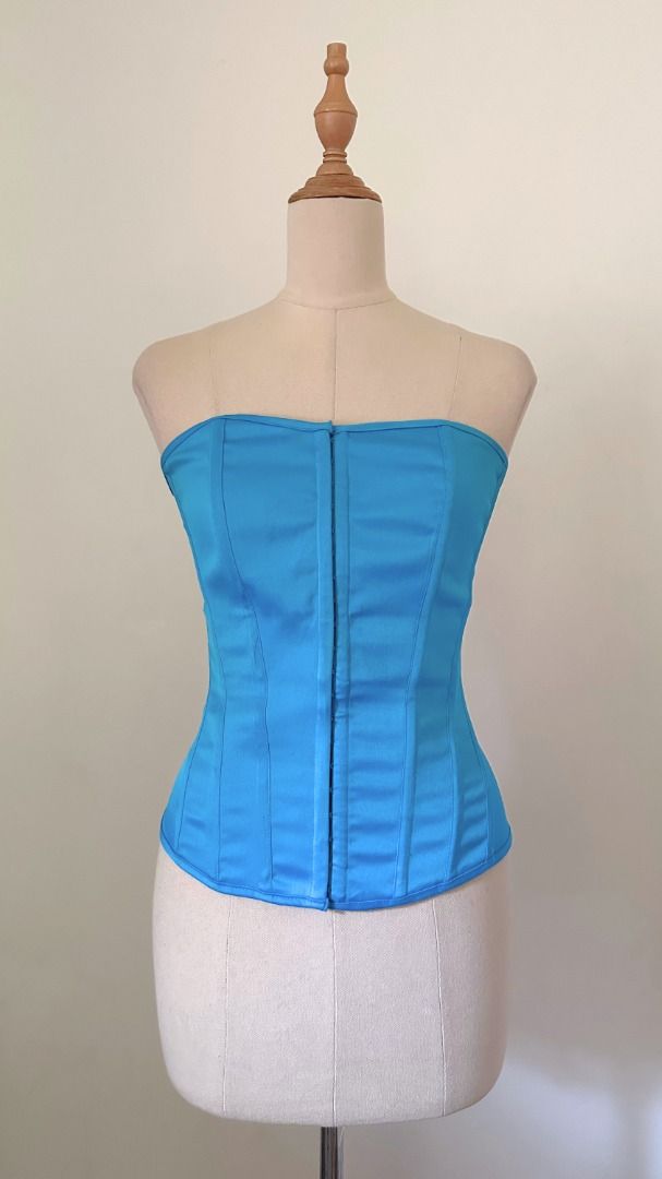 charlotte russe cerulean blue corset (Category: Sleeveless) located in Taguig. Submitted by esquepade (Listing ID 1469730382, Image 1). Description: size — medium to semi-large bust: 36"-38" details — • silk fabric • ribbon closure • has minimal frays.