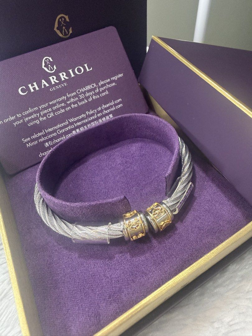 Charriol Char Logo Cable Bangle (Category: Bracelets) located in Las Pinas. Submitted by purse.vanity (Listing ID 1469674619, Image 1). Description: - Brand: Charriol - Model: Char Logo Cable Bangle - Color: Silver and gold tone - Size: small - Condition: Brand new, unworn, with protective plastic tubing intact - Inclusions: Original purple presentation box, pouch, and international warranty card dated September 2026 - 100% authentic and ready to
