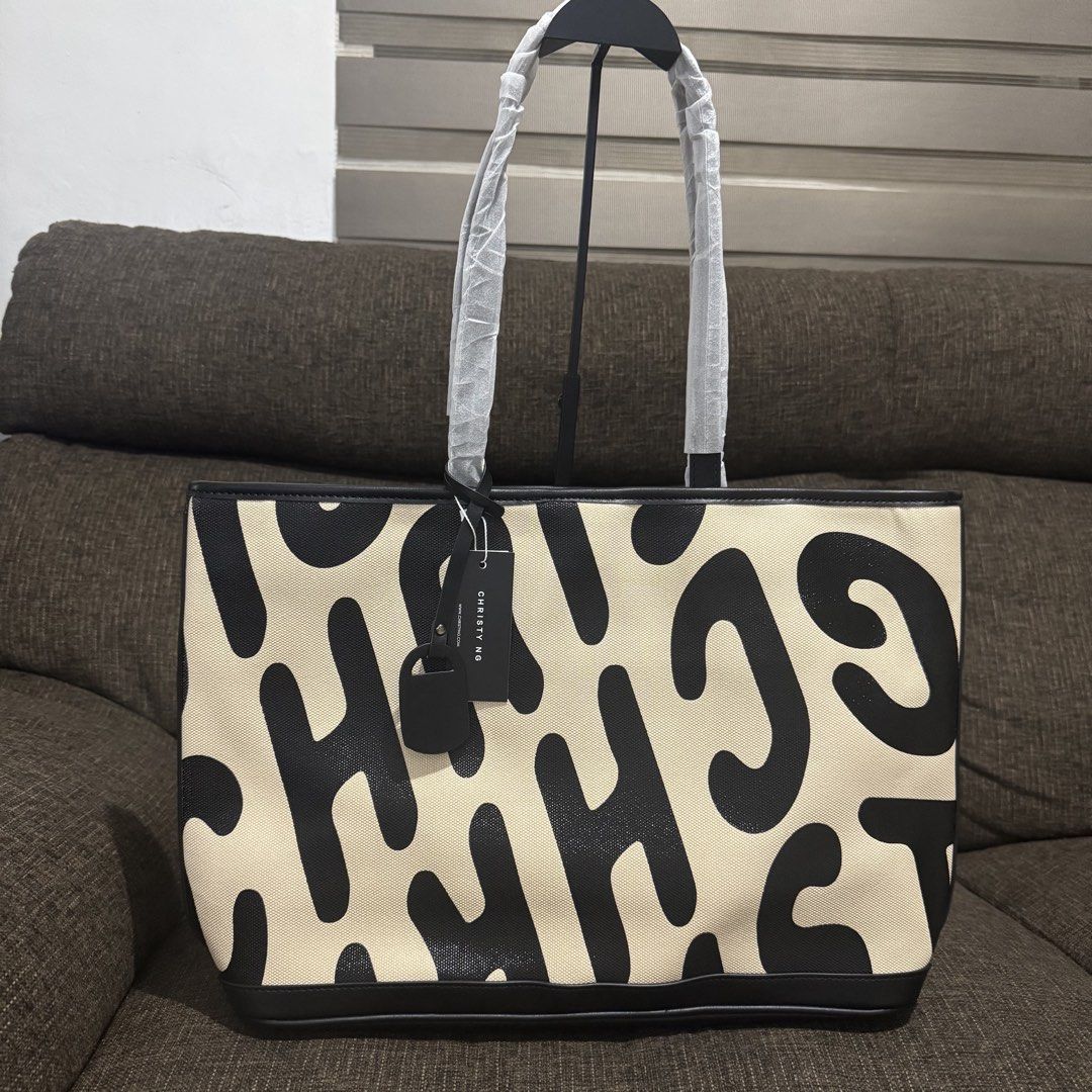 Christy Ng Logo Tote Bag (Category: Tote Bags) located in Bulacan. Submitted by mykakarizza (Listing ID 1469684803, Image 1). Description: STOCKS ONHAND✨✨ ₱830 only Christy Ng Logo Tote Bag Magnetic button closure 1 compartment, 1 zip pocket & 2 slip pocket 18" (L) x 11.5" (H) x 4.5" (W) Add paperbag 100 📸 Actual pics! 🙋🏻‍♀️ ─── ✦ ─── ✦ ─── ✦ ─── ✦ ─── 🛍️ LOOKING FOR MORE RESELLERS 🛍️ ✨ Buy 3 pcs of ANY items — FREE SHIPPING NA!🚚 ✨ Buy 10 i