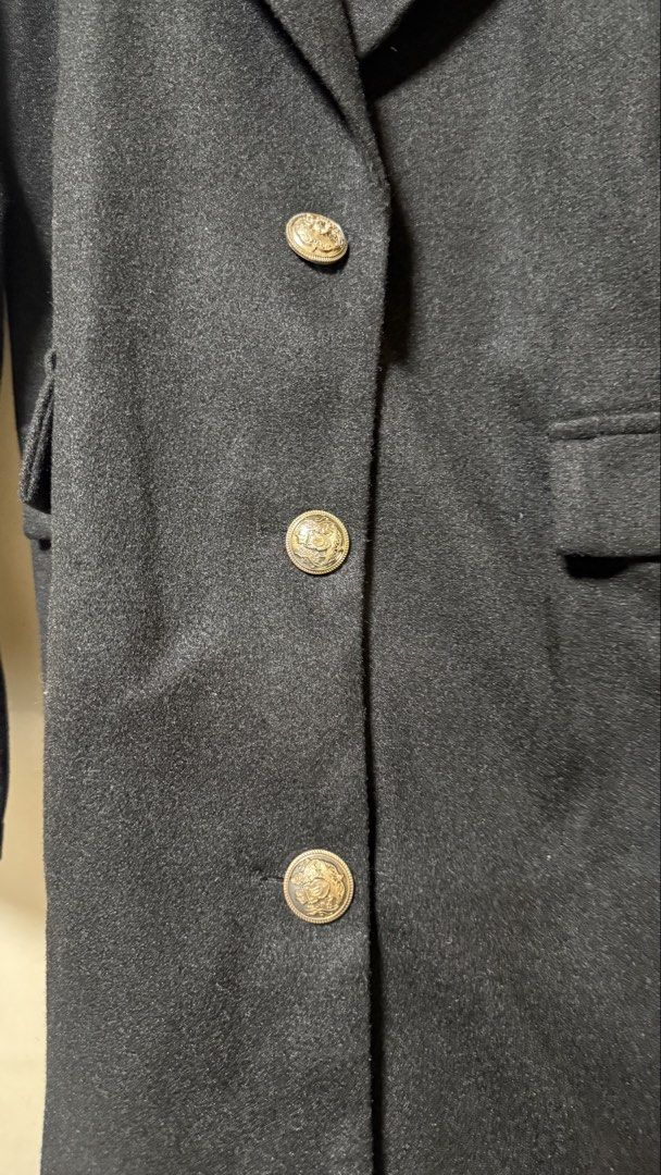 Classic Black Wool Winter Coat with Gold Buttons (Category: Coats, Jackets and Outerwear) located in Makati City. Submitted by mbcab (Listing ID 1469688417, Image 3). Description: - Color: Classic Black - Large - Bought in Shein - Style: Knee-length winter coat with a chic lapel collar - Details: Three decorative front gold buttons and two flap pockets - Fit: Long sleeves, clean back with no vents, great for layering - Material: Thick, heavy-duty