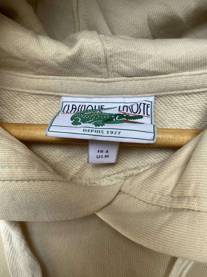 Classique Lacoste Pullover Hoodie Jacket (CREAM) (Category: Coats, Jackets and Outerwear) located in Balamban. Submitted by anikdotal (Listing ID 1469628400, Image 3). Description: Classique Lacoste Pullover Hoodie Jacket Size(Medium) Length(28) Width(22.5) Excellent Condition Price+Sf📨 LOC:BALAMBAN CEBU COURIER: J&T & FLASH EXPRESS MOP: Gcash. Payment first policy. No COD Unli Vouch. Valid id. Video Call.