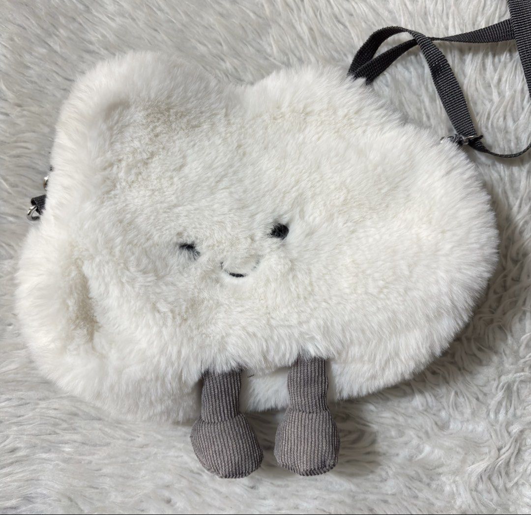 Cloud Fluffy Plush Sling Bag (Category: Cross-body Bags) located in Paranaque City. Submitted by dalle_closet (Listing ID 1469604366, Image 3). Description: slightly used pa size: 9 x 8 inches.