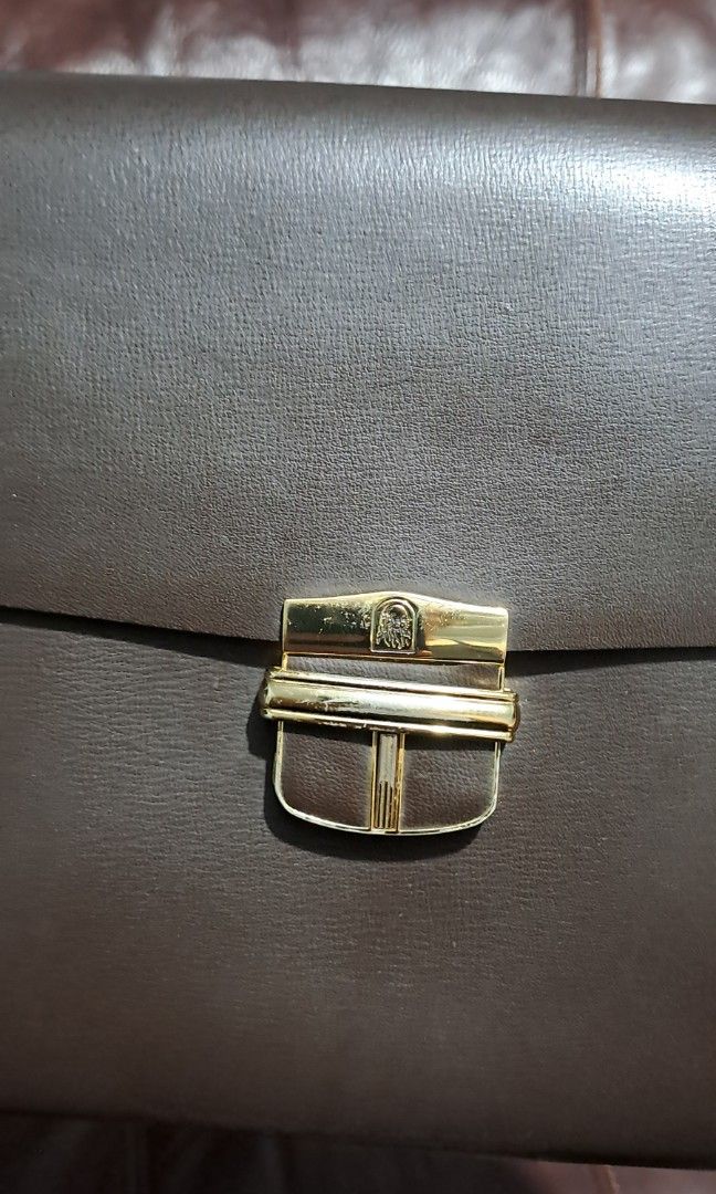 Clutch bag (Category: Belt bags, Clutches and Pouches) located in Manila. Submitted by mariefersum (Listing ID 1469676279, Image 2). Description: like new condition leather clutch bag..